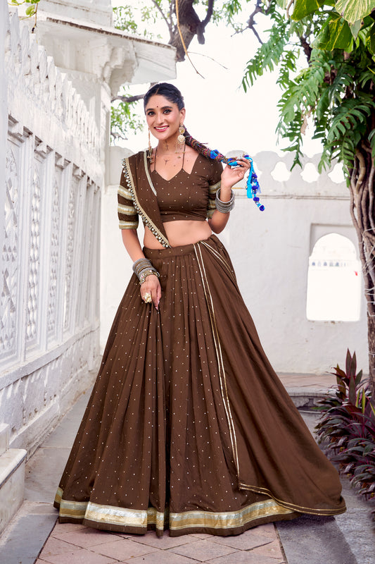 Brown Color Zari Weaving Work With Embossed Design Chanderi Lehenga Choli