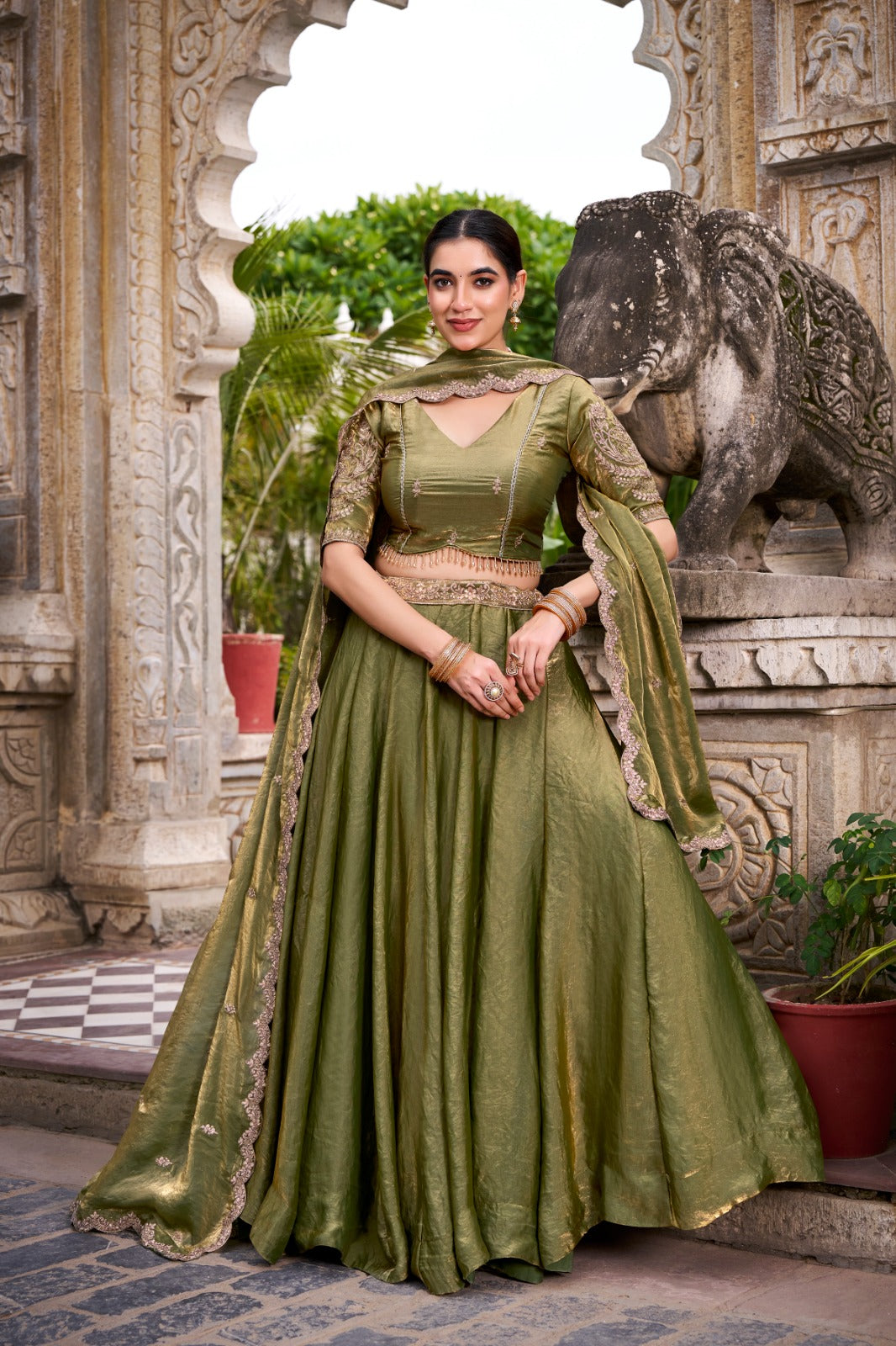 Mehandi Color Sequins And Thread Embroidery Work Belt Fendi Lehenga Choli
