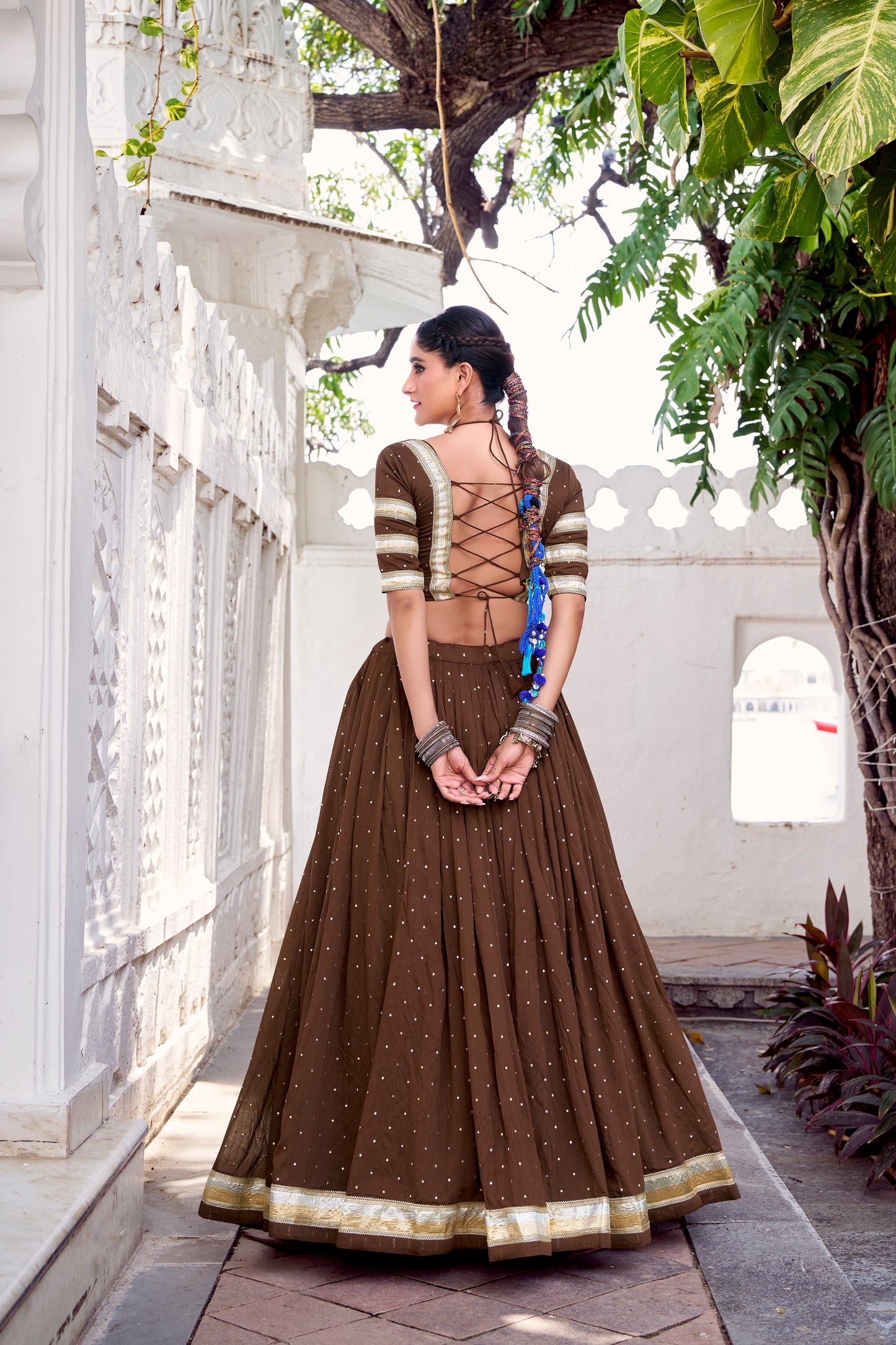 Brown Color Zari Weaving Work With Embossed Design Chanderi Lehenga Choli