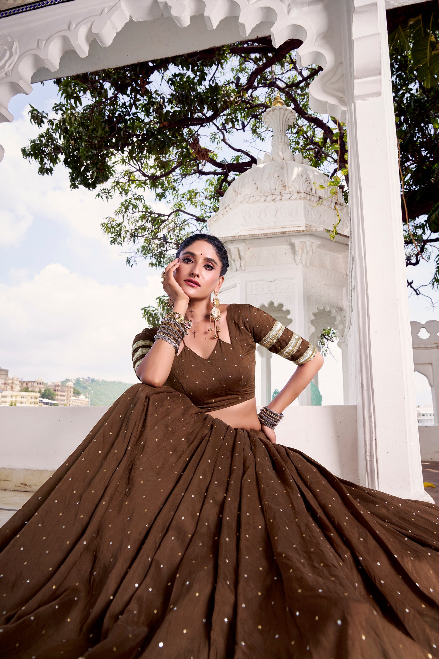 Brown Color Zari Weaving Work With Embossed Design Chanderi Lehenga Choli