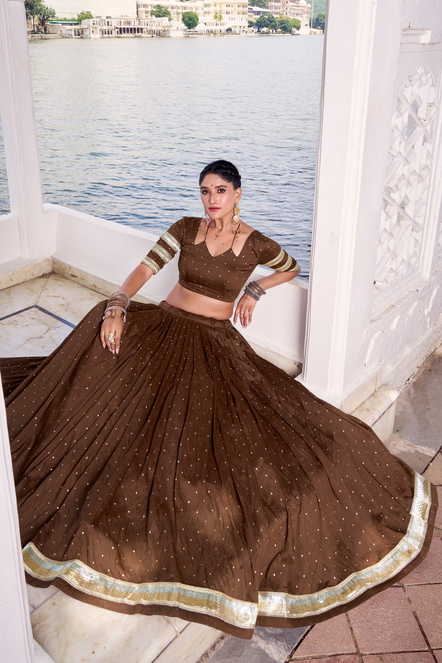 Brown Color Zari Weaving Work With Embossed Design Chanderi Lehenga Choli