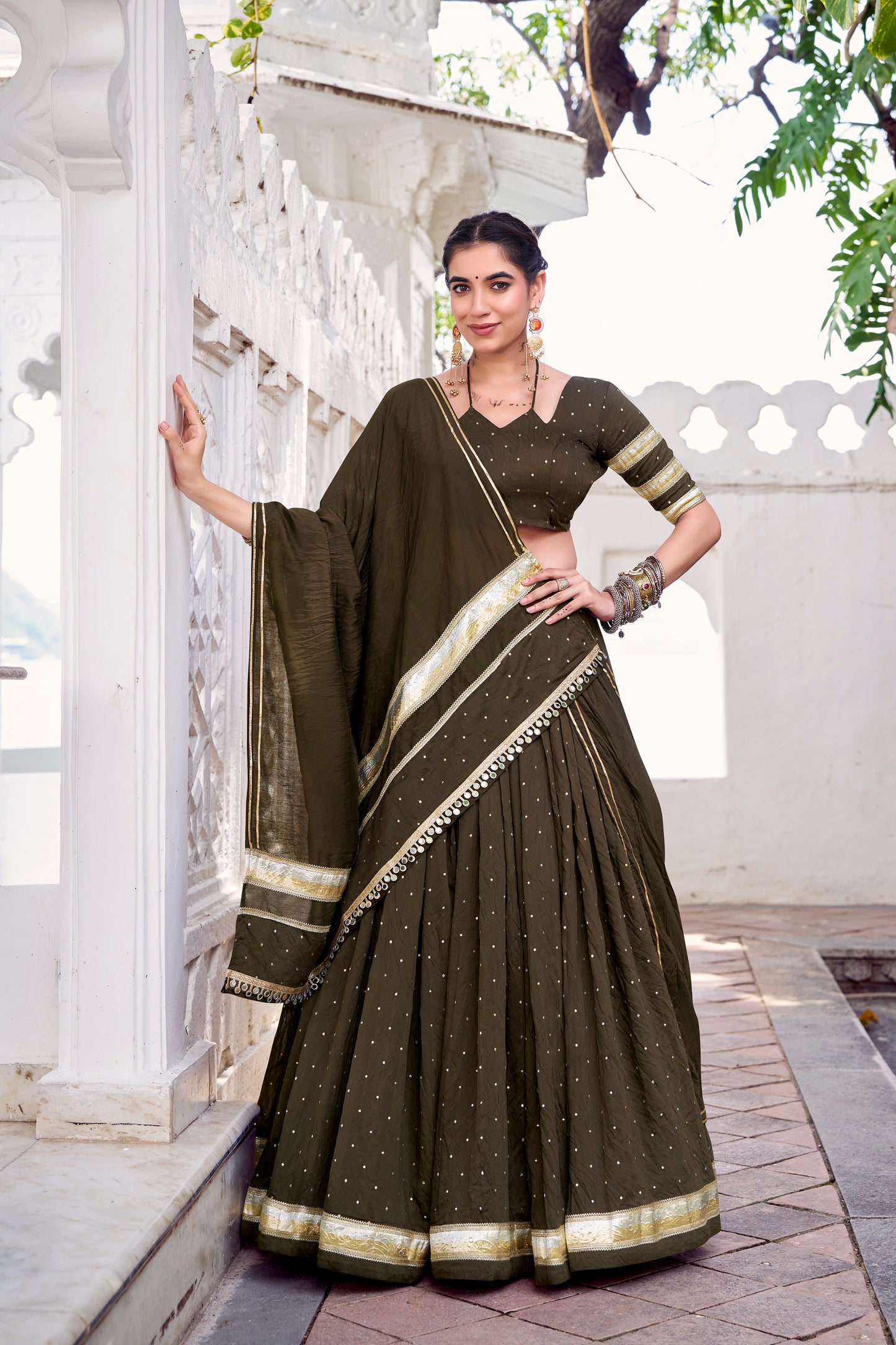 Mehendi Color Zari Weaving Work With Embossed Design Chanderi Lehenga Choli