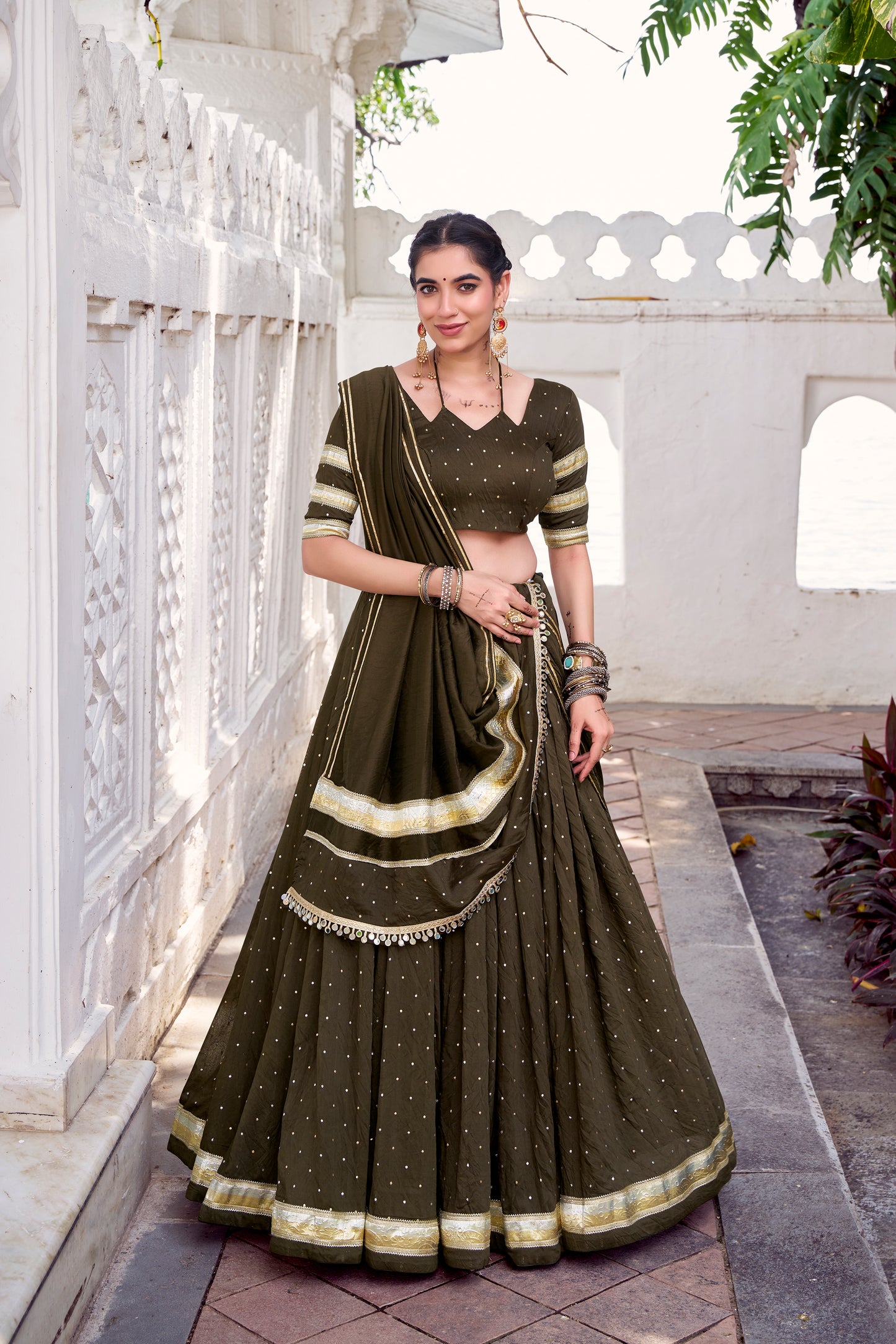 Mehendi Color Zari Weaving Work With Embossed Design Chanderi Lehenga Choli