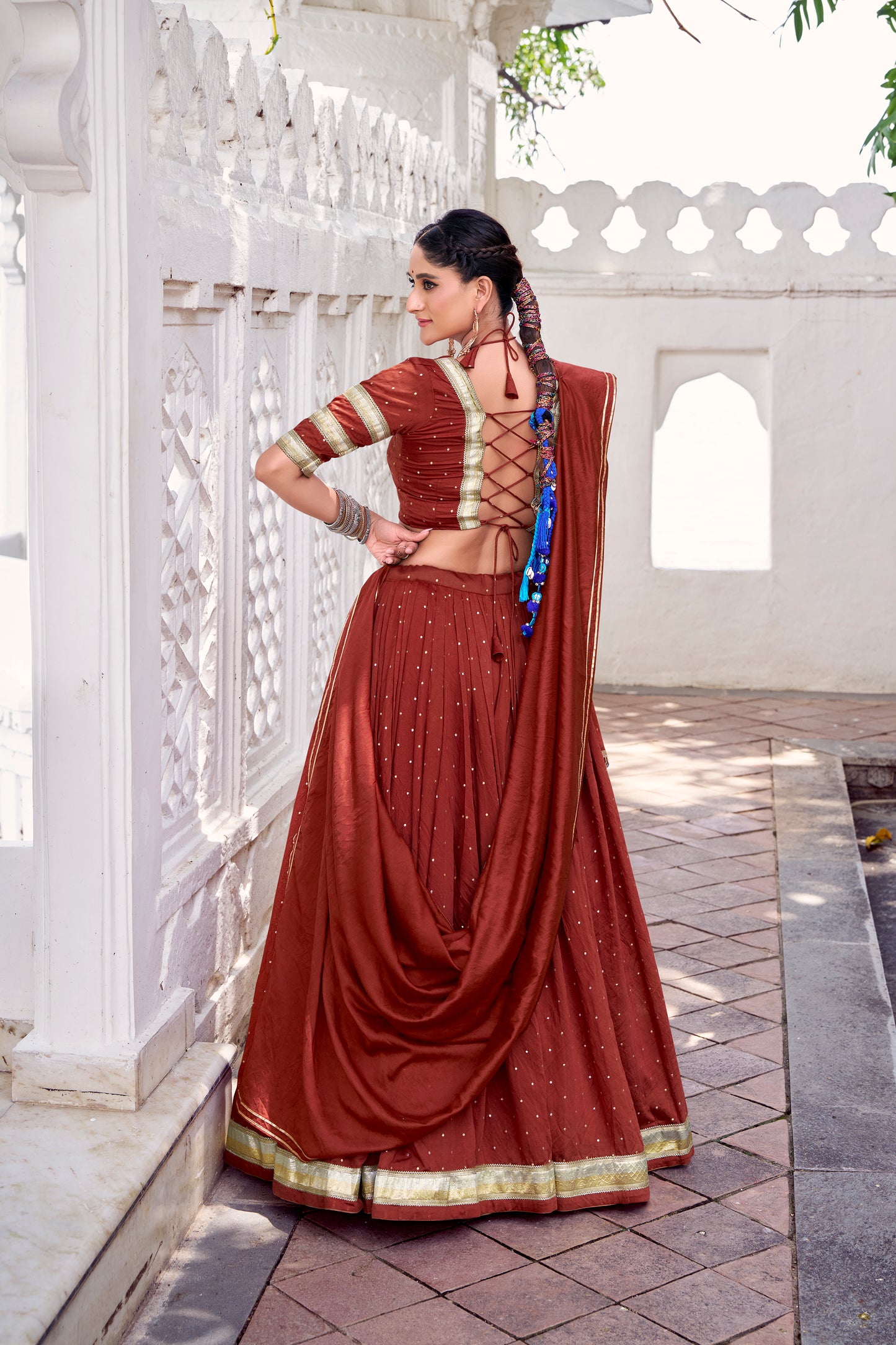 Rust Orange Color Zari Weaving Work With Embossed Design Chanderi Lehenga Choli