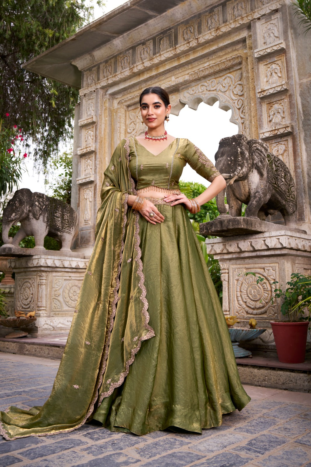 Mehandi Color Sequins And Thread Embroidery Work Belt Fendi Lehenga Choli